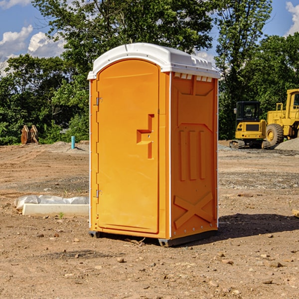 what is the cost difference between standard and deluxe portable toilet rentals in Portersville